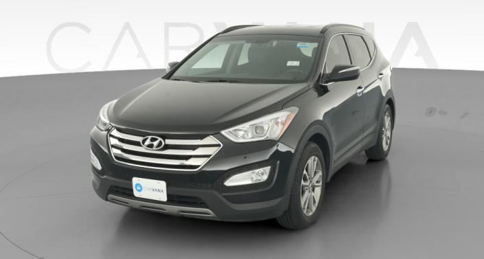 hyundai santa fe 2014 5XYZU3LAXEG125610 image hyundai santa fe 2014 5XYZU3LAXEG125610 image